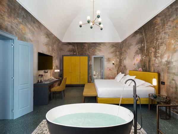 VIS Urban Suites&Spa : photo 2 de la chambre suite lit queen-size deluxe