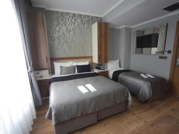 Yuvam akmarmara hotel : photo 5 de la chambre chambre triple basique