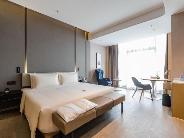 Atour Hotel Wuxi Coast City : photo 1 de la chambre jimu double room