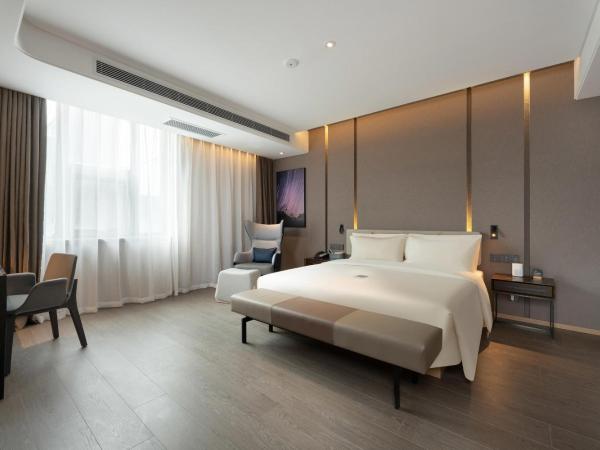 Atour S Hotel Xinghai Square : photo 2 de la chambre jimu suite
