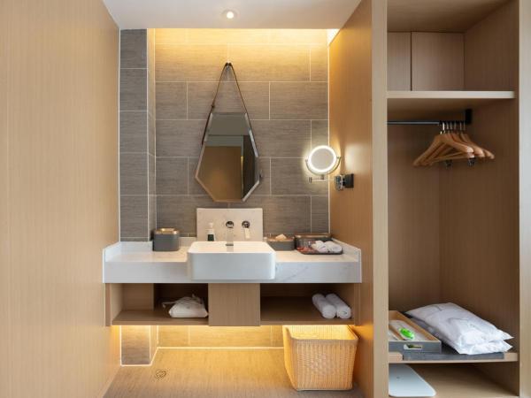 Atour S Hotel Xinghai Square : photo 6 de la chambre jimu double room with garden view