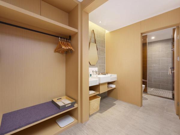 Atour S Hotel Xinghai Square : photo 9 de la chambre jimu double room with garden view
