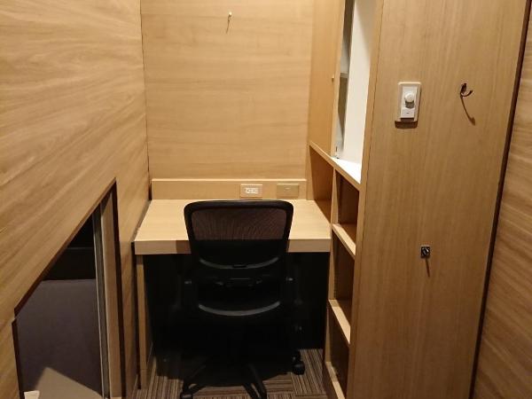 Capsule Hotel Anshin Oyado Premium Resort Kyoto Shijo Karasuma : photo 1 de la chambre chambre capsule premium pour homme