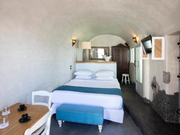 Ducato di Oia - Adults Only : photo 5 de la chambre suite deluxe avec petite piscine intérieure et vue sur caldeira