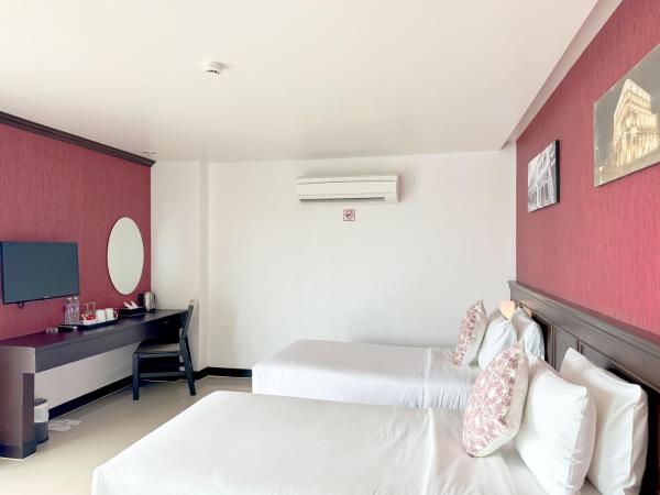 Grand Supicha City Hotel - SHA Plus : photo 4 de la chambre chambre lits jumeaux avec salle de bains privative