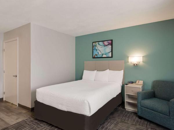 MainStay Suites Louisville Jeffersontown : photo 2 de la chambre chambre lit queen-size pour personnes à mobilité réduite avec baignoire accessible en fauteuil roulant - non-fumeurs