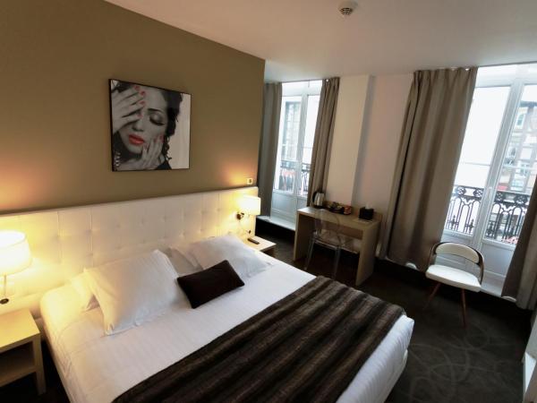 Le Saint Louis : photo 9 de la chambre chambre double avec baignoire ou douche