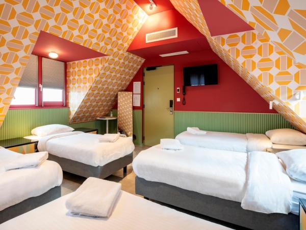 Budget Hotel Tourist Inn : photo 1 de la chambre chambre 5 personnes avec installations communes