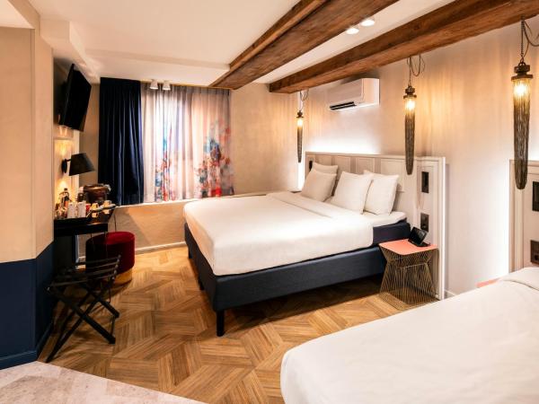 Mister Highland Hotel : photo 2 de la chambre chambre triple en sous-sol