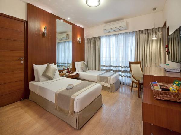 Grand Residency Hotel & Serviced Apartments : photo 1 de la chambre chambre lits jumeaux deluxe