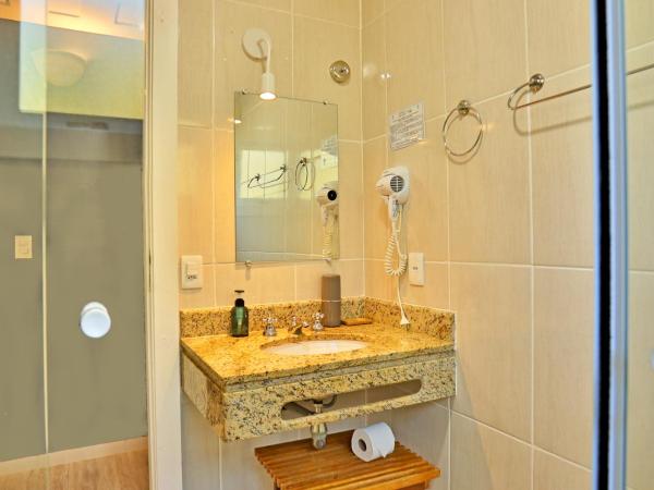 Pousada Santorini : photo 6 de la chambre chambre double avec baignoire spa