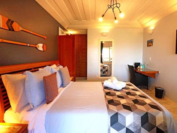 Pousada Santorini : photo 8 de la chambre chambre double avec baignoire spa
