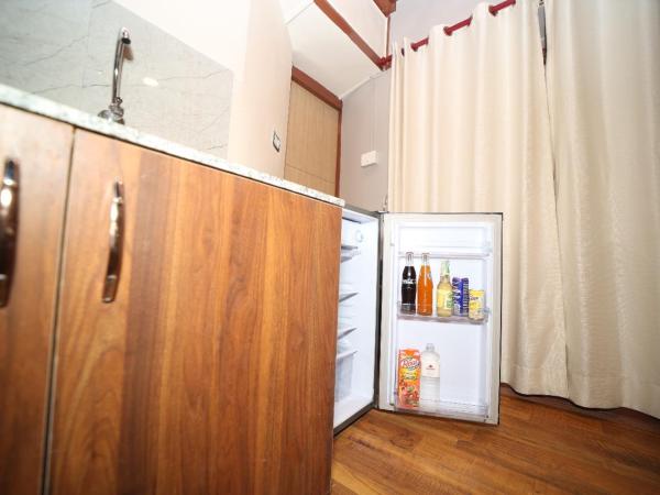 Redstone Regency Hotel : photo 4 de la chambre appartement