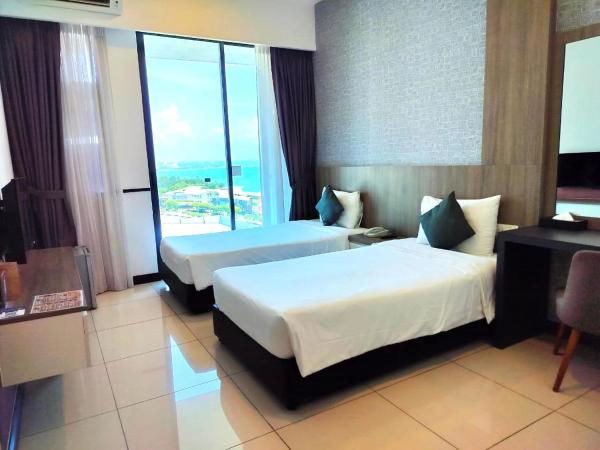 D'Wharf Hotel & Serviced Residence : photo 1 de la chambre chambre lits jumeaux supérieure