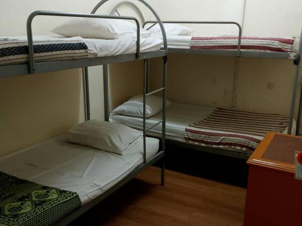 Meera Heritage Motel : photo 1 de la chambre chambre quadruple avec salle de bains commune