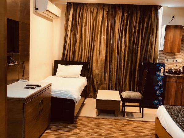 Galleria Residency : photo 2 de la chambre chambre double deluxe