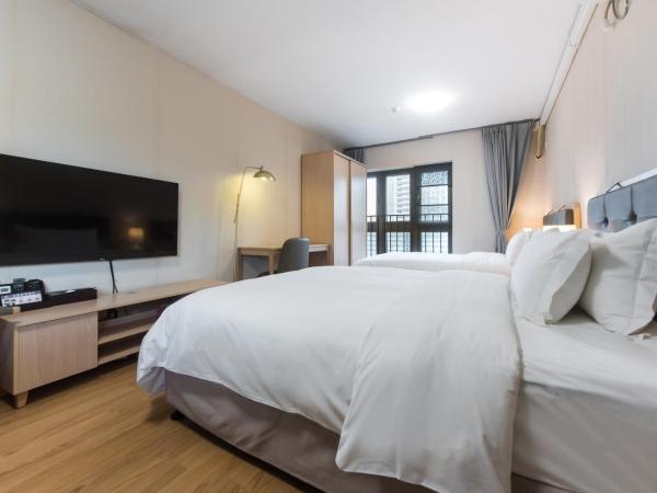 WESU Weisu Service Apartment - Shenzhen University Nanshan Science and Technolog Park : photo 8 de la chambre superior apartment (twin bed)