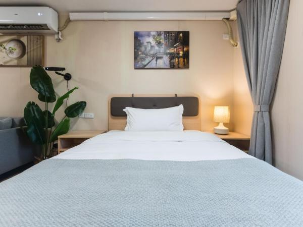 WESU Weisu Service Apartment - Shenzhen University Nanshan Science and Technolog Park : photo 8 de la chambre appartement