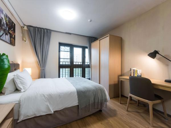 WESU Weisu Service Apartment - Shenzhen University Nanshan Science and Technolog Park : photo 10 de la chambre appartement