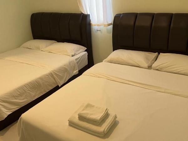 The Glorious Straits Hotel : photo 1 de la chambre chambre quadruple