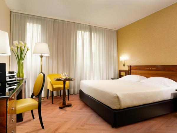 UNAHOTELS Scandinavia Milano : photo 3 de la chambre hébergement double classique avec lit d’appoint