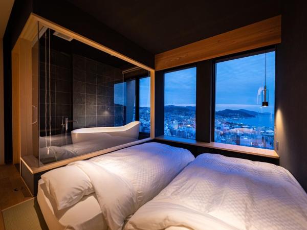 Hotel Nagasaki : photo 3 de la chambre chambre quadruple supérieure
