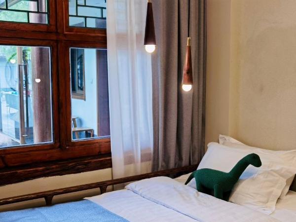 Guipu Beihai Courtyard Hotel : photo 8 de la chambre chambre lit queen-size - vue sur jardin