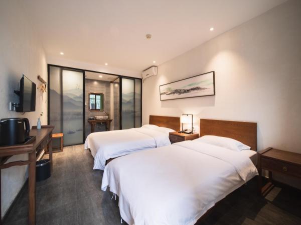 Guipu Beihai Courtyard Hotel : photo 8 de la chambre chambre familiale deluxe