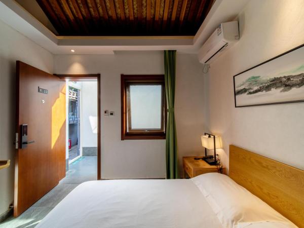 Guipu Beihai Courtyard Hotel : photo 3 de la chambre chambre supérieure