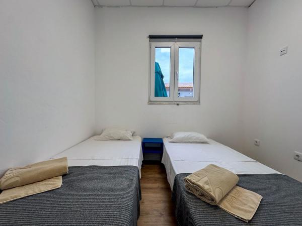 Albergaria Formosa : photo 1 de la chambre chambre lits jumeaux avec salle de bains privative séparée