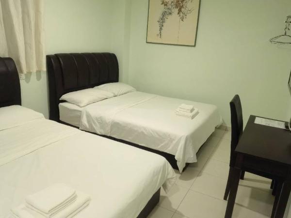 The Glorious Straits Hotel : photo 3 de la chambre chambre quadruple