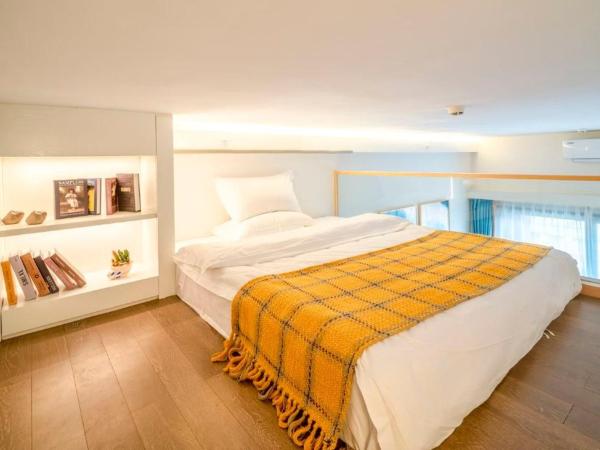 Guangzhou YuXiang Apartment - Guangzhou Pazhou International Convention and Exhibition Center : photo 6 de la chambre chambre lits jumeaux avec balcon