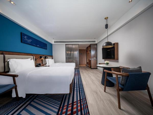 Sanya Haitang Bay Moutai Resort Superior Hotel : photo 2 de la chambre chambre lits jumeaux deluxe