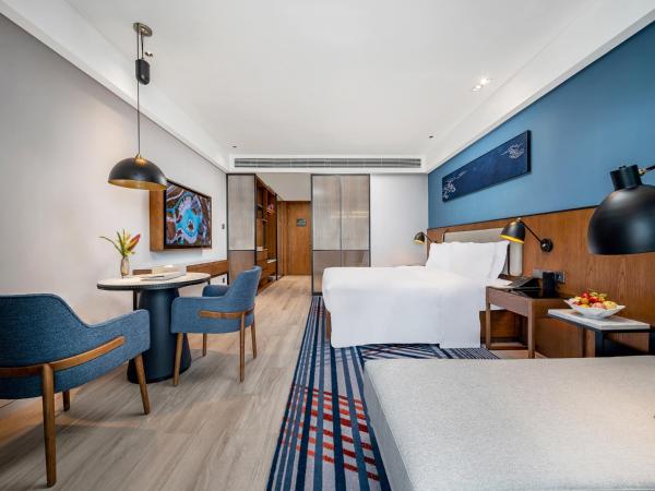 Sanya Haitang Bay Moutai Resort Superior Hotel : photo 2 de la chambre chambre lit queen-size - vue sur jardin