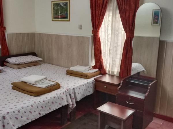 Eden Garden Farm Stay : photo 1 de la chambre chambre double - vue sur jardin