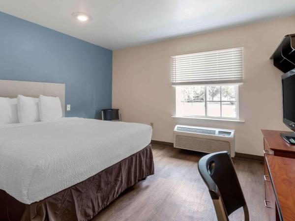 Extended Stay America Select Suites - Orlando - East : photo 2 de la chambre chambre lit queen-size