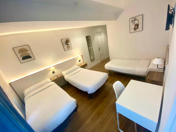 Far Home Gran Vía : photo 1 de la chambre chambre triple avec salle de bains privative