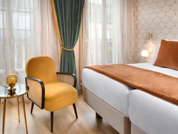 Artemisia Montmartre : photo 4 de la chambre chambre lits jumeaux supérieure