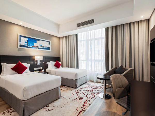 Ramada by Wyndham Dubai Barsha Heights : photo 2 de la chambre standard twin room - non-smoking with free with free shuttle bus to jbr beach, dubai hills mall, outlet mall, and 10% f&b discount