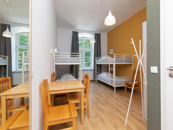 Atlantis Hostel : photo 4 de la chambre lit dans dortoir de 4 lits avec salle de bains privative