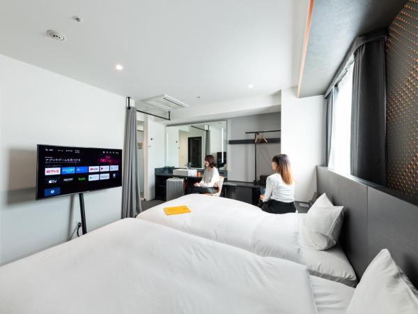 sequence SUIDOBASHI - Tokyo : photo 1 de la chambre chambre lits jumeaux