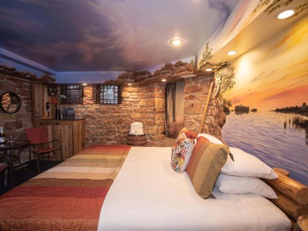 The Anniversary Inn - South Temple : photo 2 de la chambre chambre lit queen-size - vue sur jardin