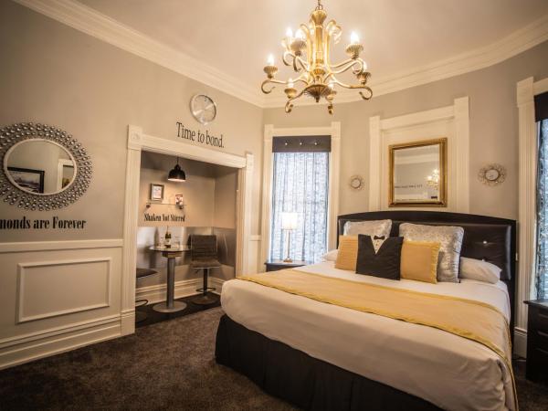 The Anniversary Inn - South Temple : photo 1 de la chambre chambre lit king-size - vue sur piscine