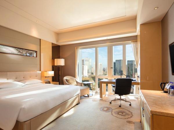 Hilton Dalian : photo 4 de la chambre chambre lit king-size - accessible aux personnes à mobilité réduite