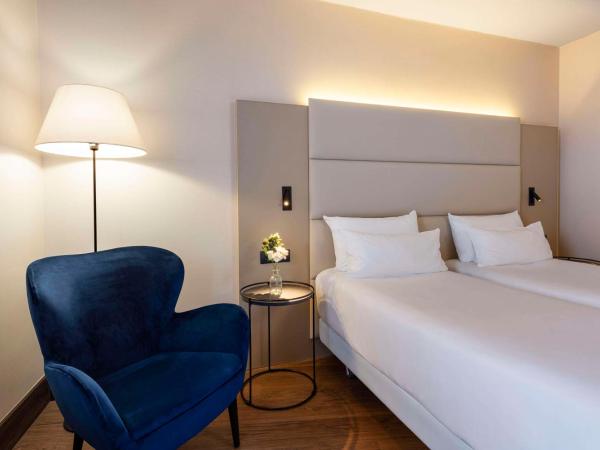 NH Geneva Airport Hotel : photo 1 de la chambre chambre lits jumeaux standard