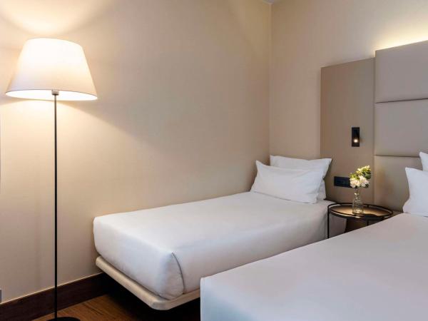 NH Geneva Airport Hotel : photo 2 de la chambre chambre lits jumeaux standard