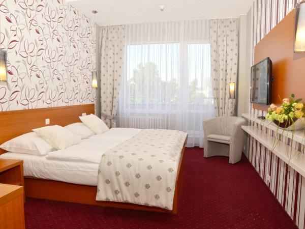 Avanti Hotel : photo 1 de la chambre chambre double ou lits jumeaux avec accès au centre relax public