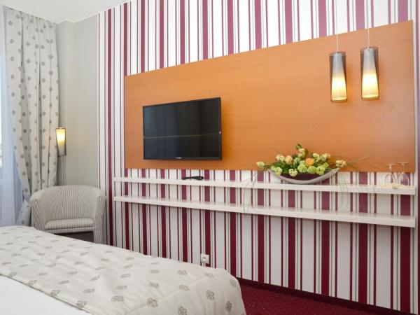 Avanti Hotel : photo 2 de la chambre chambre double ou lits jumeaux avec accès au centre relax public