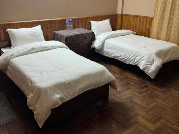 Boudha Dungkar guest house : photo 3 de la chambre chambre lits jumeaux standard