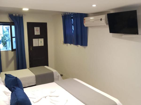 Pousada Estrela do Mar : photo 9 de la chambre chambre triple confort